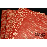 Traditional Japanese Yuzen origami folding paper with golden patterns 紅染