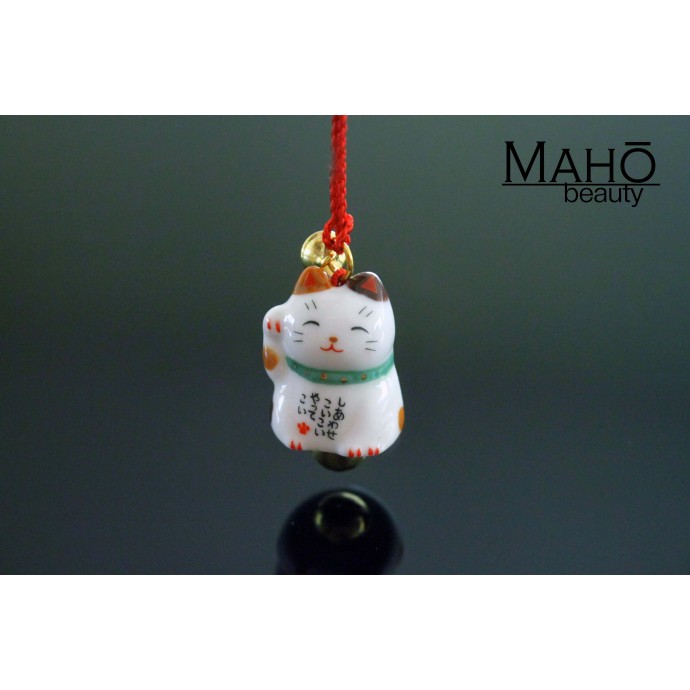 Cute good luck charm Maneki Neko - Japanese fortune cat. tri-color